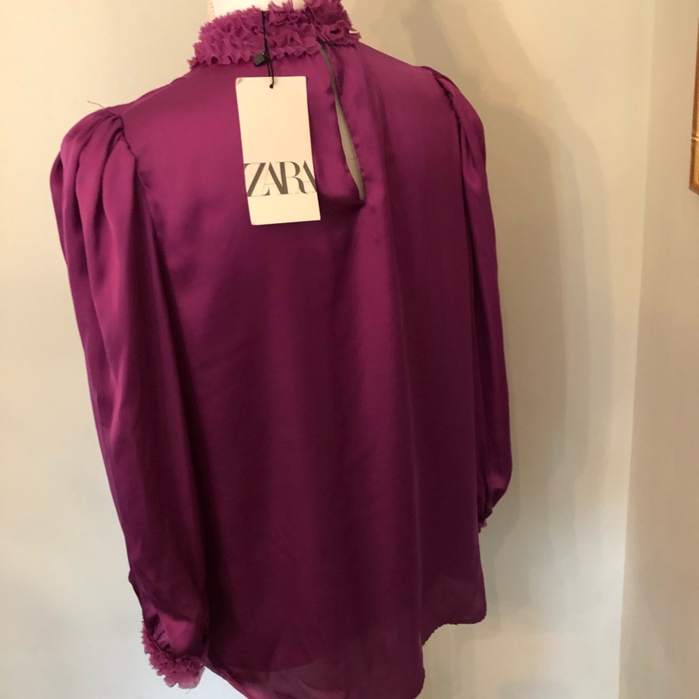 Purple Zara ruffle neck and sleeve blouse. Size M